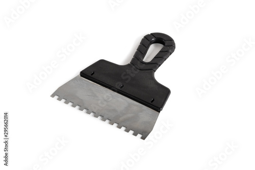 Construction spatula with teeth.