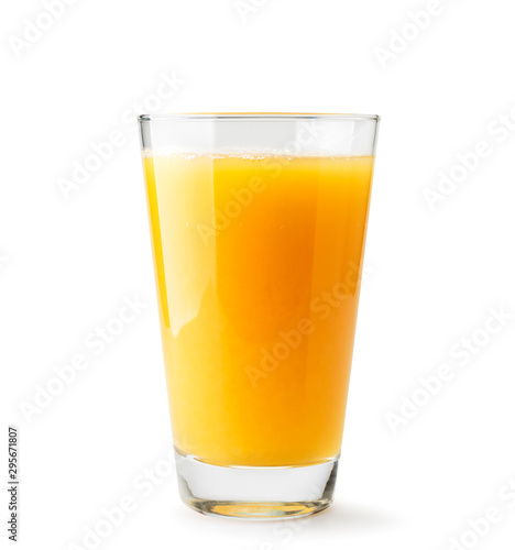 Orange juice in a glass close-up on a white. Isolated