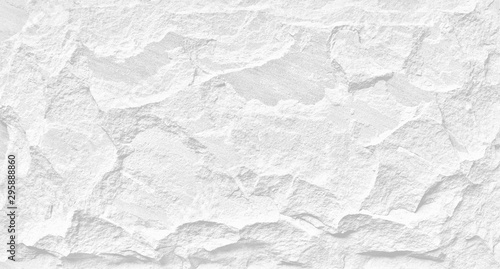 White stone grunge background, rough rock wall texture