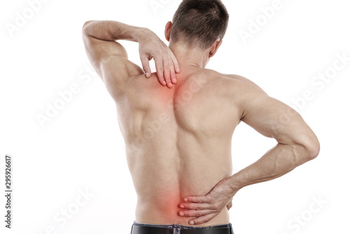 Man suffering from back and neck pain. Muscle spasm, .Chiropractic concept. Sport exercising injury