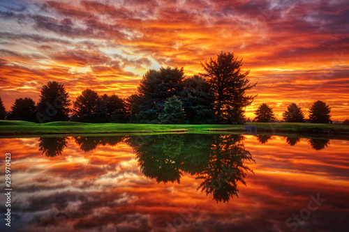 Dramatic sunrise Clouds with Lake Reflection HDR