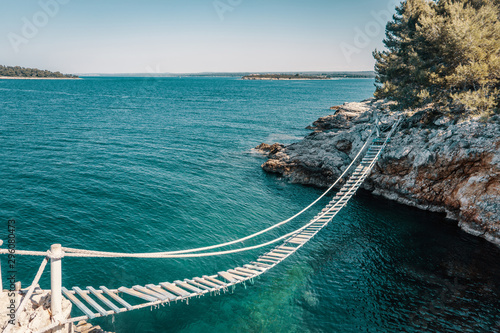 Above the rope bridge over a cliff in Punta Christo, Pula, Croatia - Europe. Travel photography, perfect for magazines and travel destination articles.