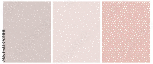 3 Cute Abstract Geometric Vector Patterns. White, Pink and Beige Color Design. Brushed Raindrops on a Light Brown Background.Irregular White Dots on a Light Pink. Romantic Print With White Tiny Hearts