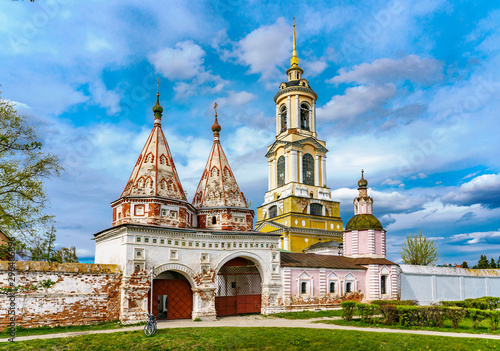Twin gates and bell tower of Rizopolozhensky monastery in Suzdal, a well preserved old Russian town-museum. A member of the Golden ring of Russia