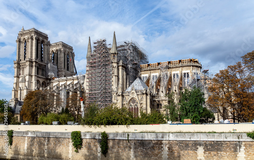 Notre Dame de Paris under reconstruction in October 2019. Wood Shoring now prevent the flying buttresses from collapsing.