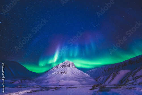 The polar arctic Northern lights hunting aurora borealis sky star in Norway travel photographer Svalbard in Longyearbyen city the moon mountains