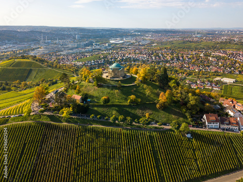 Aerial of the Grave Chapel (Grabkapelle) on Rotenberg and surrounding industrial area with museums and soccer stadium on a beautiful autumn day in Stuttgart, Germany