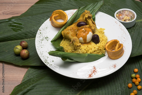 Food of the Peruvian jungle, Juane with rice and chicken wrapped in banana leaves