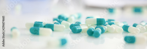 Tablets scattered on the table of the pharmaceutical