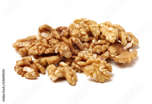 Half peeled walnut closeup isolated on white background