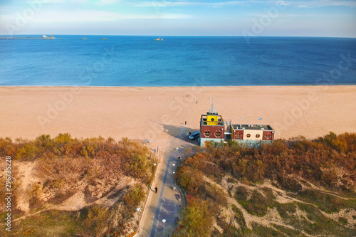 Aerial landscape of the beautiful beach with lifeguards house at Baltic Sea in Gdansk, Poland