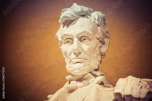 Night time image of the statue of Abraham Lincoln in the Lincoln Memorial in Washington DC.