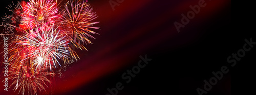 Fireworks, colorful sylvester-fireworks on black background with coloured accent