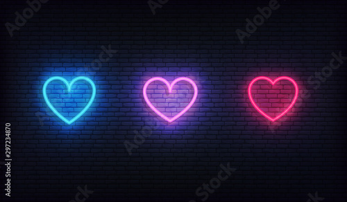 Heart neon icons set. Glowing bright red, purple and blue hearts