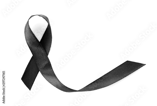 Black ribbon on white background, top view. Funeral symbol