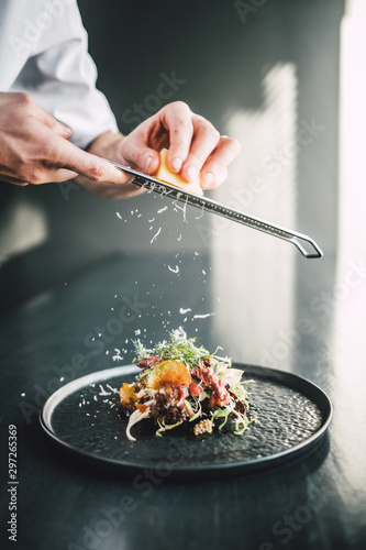 Healthy and delicious beef sandwich on dark table at restaurant, chef making food