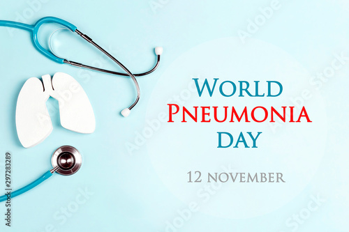 World pneumonia day concept with lungs and stethoscope on a blue background.