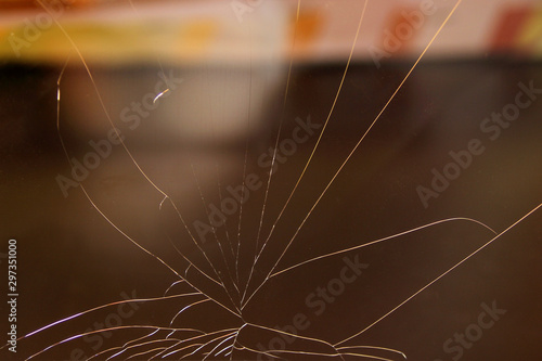 texture of glass broken into small cracks, warm tinting, close-up, copy space