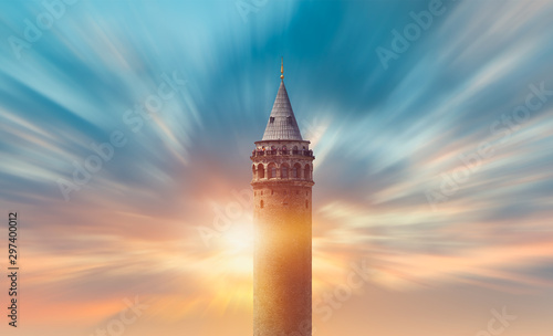Galata Tower with bright sunset sky - Istanbul, Turkey