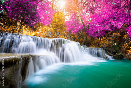 Amazing in nature, beautiful waterfall at colorful autumn forest in fall season