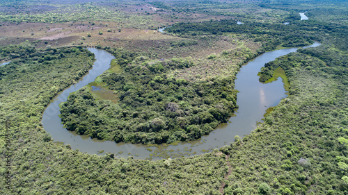 Areal view of typical Pantanal landscape, tropical river bend through rainforest and deforested areas, Pantanal Wetlands, Mato Grosso, Brazil