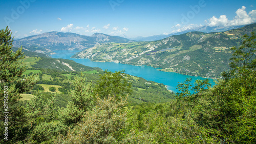 Majestic mountain lake Serre-Ponçon (Lac de Serre-Ponçon) is a lake in southeast France; it is one of the largest artificial lakes in western Europe. HD wallpaper, 4k green background