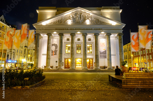 Nightshots of illuminated facade of Theater Aachen, which is the principal venue for operas, musical theatre and plays.