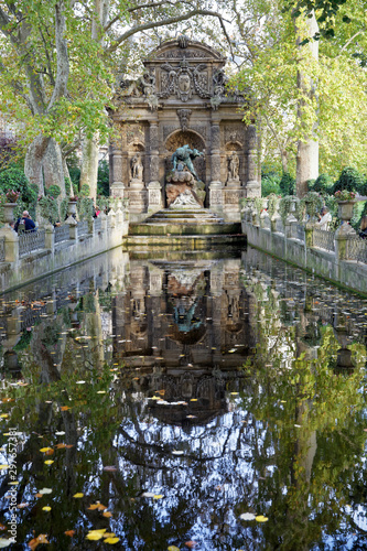 Paris, France - October 12, 2019 : The Medici Fountain, fontaine Medicis, is a monumental fountain in the Jardin du Luxembourg in the 6th arrondissement in Paris