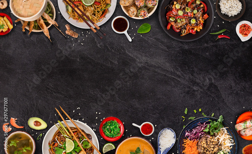 Asian food background with various ingredients on rustic stone background , top view. Vietnam or Thai cuisine.