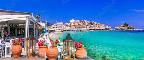 Most beautiful traditional villages of Greece - Kokkari in Samos island. crystal sea and taverns