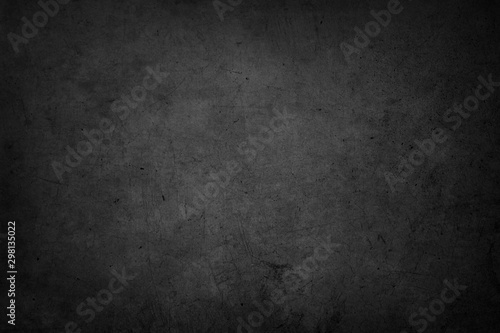 Dark grunge textured concrete background