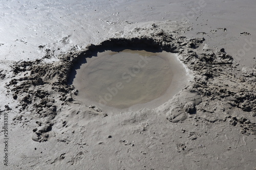 puddle of mud sand