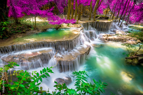 Amazing in nature, beautiful waterfall at colorful autumn forest in fall season