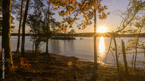 A scenic autumn view of a sunset over Lake Norman in North Carolina.