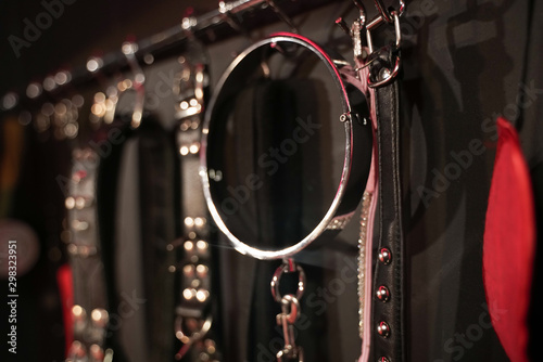 Whips for BDSM on a dark background. Accessory for sexual games.