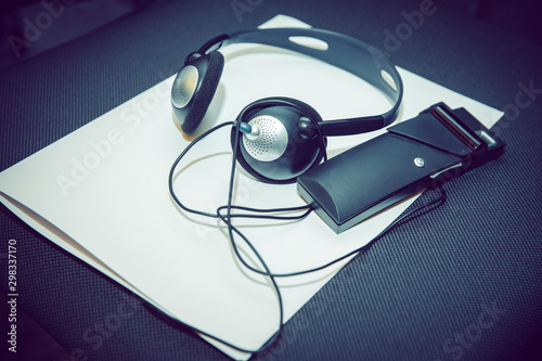 headphones used for simultaneous translation equipment simultaneous interpretation equipment . A set of headphones for simultaneous translation during negotiations in foreign languages.