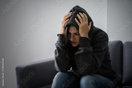 Stressed Woman In Hoodie