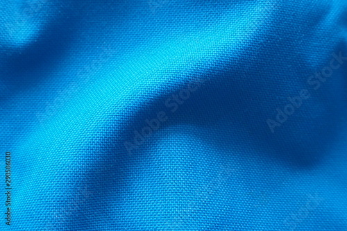 Closeup of beautiful quality cotton mixed with polyester fabric in dark blue tone for textile texture seamless pattern and cool banner or background