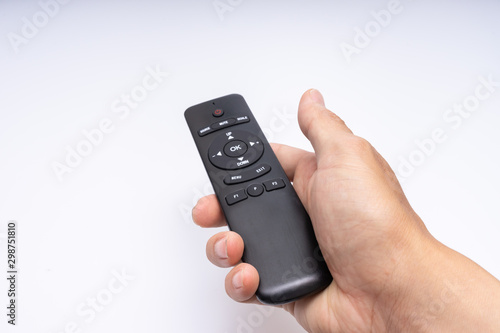  Hand holding a remote control