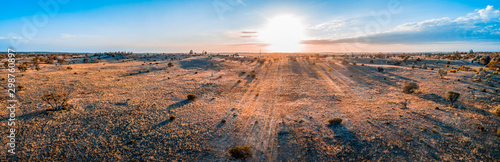 Sunrise over Australian desert - wide aerial panoramic landscape
