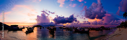 Panorama view of sunrise morning beach with boat sky cloud