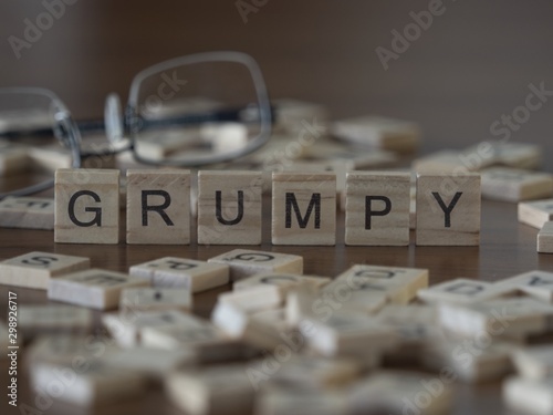 The concept of Grumpy represented by wooden letter tiles