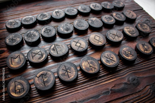 Set of anglo-saxon runes carved in wood - anglo-saxon futhark (futhorc)