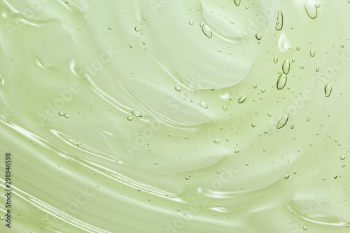 Aloe vera gel texture. Clear cosmetic cream, face serum, moisturizer background