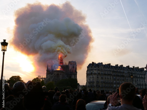 The spire of Notre Dame falling down on 15th April 2019 during the huge fire.