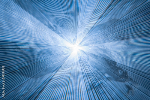 abstract blue background with diverging light rays