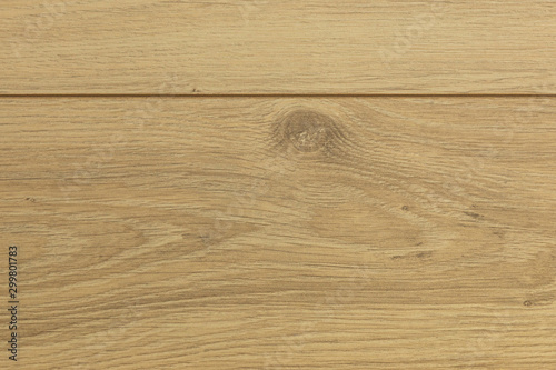 Elevated view of bass-wood laminate floor covering of flaxen color