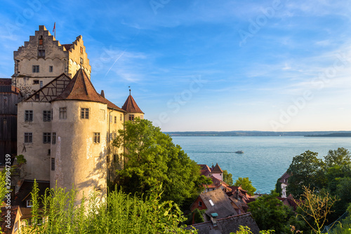 Meersburg Castle at Lake Constance or Bodensee, Germany. This medieval castle is landmark of Meersburg town. Scenic view of old German castle in summer. Nice Swabian landscape in sunset light.