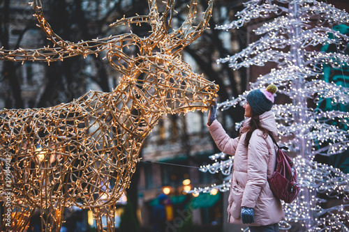 Christmas decorations in the historical center streets of Helsinki, with evening light illumination, concept of Christmas in Finland, with Cathedral, market square, christmas tree