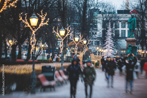 Christmas decorations in the historical center streets of Helsinki, with evening light illumination, concept of Christmas in Finland, with Cathedral, market square, christmas tree